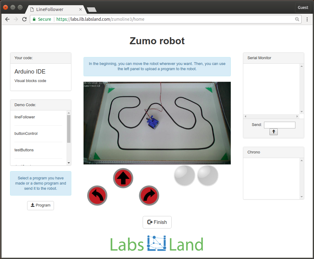 LabsLand Arduino robot on a racetrack, with programming and movement controls.